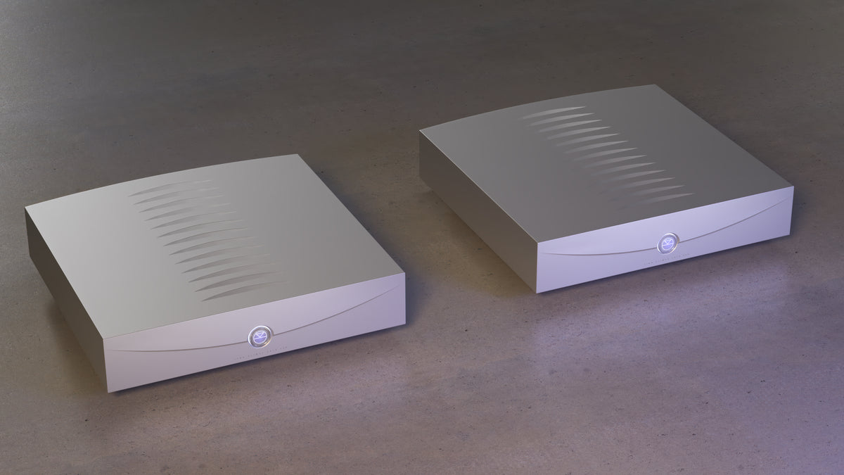 Pair of silver Linn Klimax Solo 500 mono power amplifiers in a styled setting