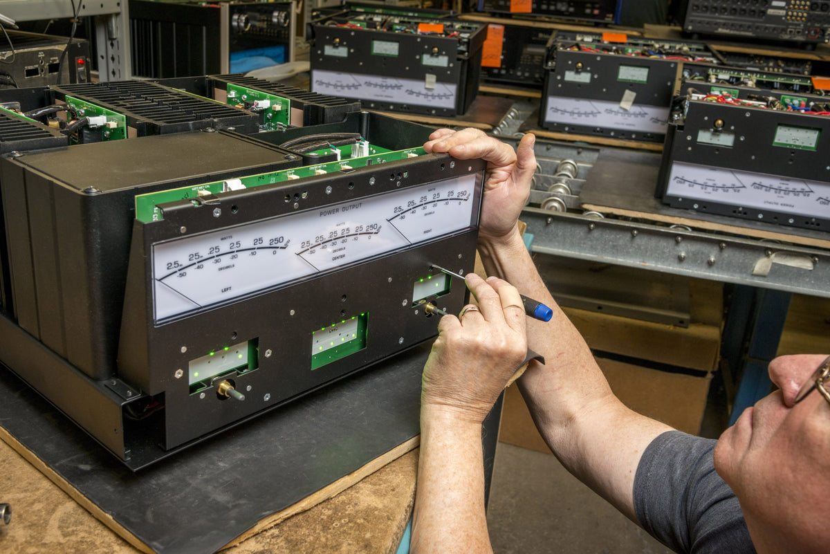 Final test in Binghamton: every McIntosh amplifier is checked on the bench, meters included, before it ships